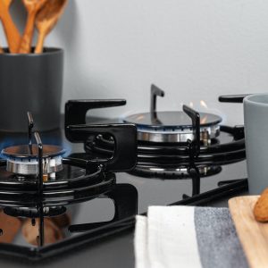 Burning gas stove burner in a kitchen